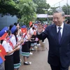Chủ tịch nước Tô Lâm đến thăm Trường song ngữ Lào-Việt Nam. (Ảnh: Nhan Sáng-TTXVN)