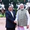 ​Thủ tướng Narendra Modi đón Thủ tướng Phạm Minh Chính​ thăm cấp Nhà nước đến Ấn Độ. (Ảnh: Dương Giang/TTXVN)