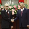 Chủ tịch nước Tô Lâm và Tổng thống Liên bang Nga Vladimir Putin chụp ảnh chung nhân chuyến thăm cấp Nhà nước của Tổng thống Putin đến Việt Nam vào tháng 6/2024. (Ảnh: Nhan Sáng/TTXVN)