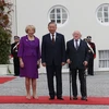 Tổng thống Ireland Michael D. Higgins và Phu nhân đón Tổng Bí thư, Chủ tịch nước Tô Lâm. (Ảnh: Trí Dũng/TTXVN)