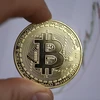 Đồng tiền kỹ thuật số Bitcoin. (Ảnh: AFP/TTXVN)