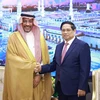 Thủ tướng Phạm Minh Chính tiếp Bộ trưởng Công nghiệp và Tài nguyên khoáng sản Saudi Arabia Bandar Alkhorayef. (Ảnh: Dương Giang/TTXVN)