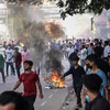 Người dân tham gia một cuộc biểu tình tại Dhaka, Bangladesh, ngày 18/7/2024. (Ảnh: Getty Images/TTXVN)