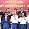 Tổng Bí thư Tô Lâm chứng kiến Hội nghị trao Giấy chứng nhận đăng ký đầu tư cho các dự án đầu tư trong khu kinh tế, khu công nghiệp trên địa bàn thành phố. (Ảnh: Thống Nhất/TTXVN)