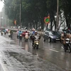 [Photo] Dân Hà Nội khốn khổ vì thời tiết mưa phùn, nồm ẩm kéo dài 