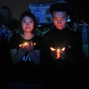 [Photo] Hàng ngàn người dân Thủ đô tắt đèn sớm đón Giờ Trái Đất 