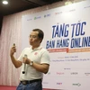 Ông Trần Hải Linh chia sẻ các vấn đề doanh nghiệp gặp phải khi tham gia mô hình thương mại điện tử. (Ảnh: PV/Vietnam+)