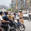 Cảnh sát giao thông Hà Nội nỗ lực đảm bảo an toàn cho Kỳ thi Trung học Phổ thông Quốc Gia (Ảnh minh họa. Nguồn: Vietnam+) 
