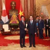 Chủ tịch nước Trần Đại Quang tiếp Thủ tướng Nhật Bản Shinzo Abe. (Ảnh: Lê Minh Sơn/Vietnam+)