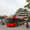 Sáng 30/6, chiếc xe buýt 2 tầng đầu tiên mang tên City Tour đã được chạy thử nghiệm trên đường phố Hà Nội. (Ảnh: Minh Sơn/Vietnam+)