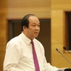Bộ trưởng Mai Tiến Dũng trong buổi họp báo Chính phủ ngày 3/8. (Ảnh: Minh Sơn/Vietnam+)