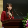 Dương Thúy Vi bật khóc khi phát biểu tại buổi lễ tuyên dương khen thưởng các vận động viên đoạt thành tích cao trong SEA Games 29. (Ảnh: Minh Sơn/Vietnam+)