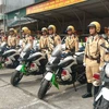 Lực lượng Cảnh sát giao thông đã sẵn sàng các phương tiện, công cụ hỗ trợ làm nhiệm vụ dẫn đoàn. (Ảnh: PV/Vietnam+)