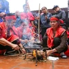 Cứ mồng 8 Tết hàng năm, tại sân đình làng Thị Cấm, xã Xuân Phương (Từ Liêm, Hà Nội) lại diễn ra lễ hội kéo lửa thổi cơm làng Thị Cấm. (Ảnh: Minh Sơn/Vietnam+)