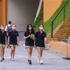 Sáng 4/5, toàn bộ các trường học tại Hà Nội đã tổ chức cho học sinh Trung học cơ sở và Trung học phổ thông đi học lại sau thời gian dài nghỉ để phòng chống dịch COVID-19. (Ảnh: Minh Sơn/Vietnam+)