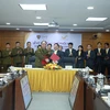 VietnamPost và Tổng cục Quản lý thị trường thực hiện nghi thức ký Quy chế phối hợp. (Ảnh: Bưu điện Việt Nam)