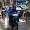 Theo Trung tâm Dự báo Khí tượng Thủy văn Quốc gia, nhiệt độ lúc 7 giờ là 21 độ C và có mưa nhỏ. (Ảnh: PV/Vietnam+)