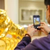 Sát ngày Vía Thần Tài 2022, Tập đoàn DOJI đã tung ra một sản phẩm Hổ vàng nguyên khối nặng tới 46 cân thu hút nhiều khách hàng. (Ảnh: Minh Sơn/Vietnam+) 