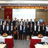 Hội đồng chấm giải và các doanh nghiệp đoạt giải thưởng 'Chìa khóa vàng' 2022. (Ảnh: PV/Vietnam+)