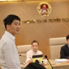 Ông Nguyễn Phong Nhã - Phó Cục trưởng Cục Viễn thông thông tin về hoạt động chuẩn hóa thông tin thuê bao di động. (Ảnh: Minh Sơn/Vietnam+)
