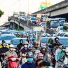 Chiều 31/8 trước kỳ nghỉ lễ Quốc khánh 2/9, nhiều tuyến đường ra vào cửa ngõ Thủ đô bắt đầu xảy ra hiện tượng ùn tắc. (Ảnh: PV/Vietnam+) 