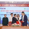 Thông tấn xã Việt Nam ký kết thoả thuận hợp tác với trình duyệt Made in Vietnam Cốc Cốc. (Ảnh: Minh Sơn/Vietnam+)