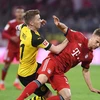 Kimmich truy cản Reus ở trận đấu mà Bayern đã giành chiến thắng 5-0 vào năm 2019, qua đó xoay chuyển kết quả mùa giải và có đĩa bạc lần thứ 7 liên tiếp. (Nguồn: FcB.com)