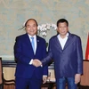 [Photo] Hoạt động của Thủ tướng Nguyễn Xuân Phúc tại Singapore