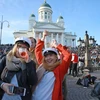 Người dân tham gia tuần hành trước thềm ngày Quốc tế lao động tại Helsinki, Phần Lan ngày 30/4. (Nguồn: THX/TTXVN) 