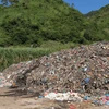 Lò đốt rác xây xong… rác thải vẫn tồn đọng. (Nguồn: Truyền hình Thông tấn)