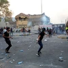 Biểu tình đang leo thang tại thành phố Basra. (Nguồn: The Register-Herald)