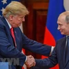 Tổng thống Nga Vladimir Putin (phải) và Tổng thống Mỹ Donald Trump trong cuộc họp báo sau cuộc gặp thượng đỉnh ở Helsinki, Phần Lan ngày 16/7. (Nguồn: AFP/ TTXVN)