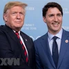 Thủ tướng Canada Justin Trudeau (phải) và Tổng thống Mỹ Donald Trump tại cuộc gặp ở Quebec của Canada ngày 8/6 vừa qua. (Ảnh: AFP/TTXVN)