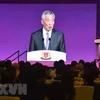 Thủ tướng Singapore Lý Hiển Long phát biểu tại diễn đàn doanh nghiệp trước thềm Hội nghị thượng đỉnh ASEAN tại Singapore ngày 12/11. (Nguồn: AFP/TTXVN)