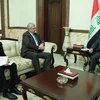 Đại sứ Nga trong một cuộc gặp với Thủ tướng Iraq Haider al-Abadi. (Nguồn: 4 Dinar)