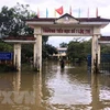 Trường học ở xã Lộc Trì (Quảng Trị) bị ngập lụt học sinh phải nghỉ học. (Ảnh: Hồ Cầu/TTXVN)