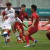 Pha ghi bàn của cầu thủ Olympic Hàn Quốc Lee Seung-woo (số 17) trong trận đấu gặp Olympic Việt Nam bán kết bóng đá nam ASIAD 2018 diễn ra ở Bogor, Indonesia ngày 29/8. (Nguônd: THX/ TTXVN)