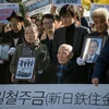 Biểu tình tại Hàn Quốc đòi công lý cho các lao động bị cưỡng ép. (Nguồn: The Straits Times)