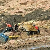 ​Lực lượng cứu hộ tìm kiếm người mất tích tại hiện trường vụ vỡ đập hồ chứa chất thải khoáng sản ở Minas Gerais, Brazil, ngày 25/1/2019. (Nguồn: THX/TTXVN)