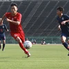 Cầu thủ U22 Việt Nam triển khai bóng tấn công. (Ảnh: Tuấn Cương/TTXVN)