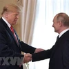 Tổng thống Mỹ Donald Trump (thứ 2, trái) và người đồng cấp Nga Vladimir Putin (phải) trong cuộc gặp thượng đỉnh tại Helsinki, Phần Lan ngày 16/7/2018. (Nguồn: AFP/TTXVN)​