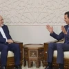 Ngoại trưởng Iran Mohammad Javad Zarif (trái) và Tổng thống Syria Bashar al-Assad. (Nguồn: www.irna.ir)