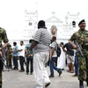 Lực lượng an ninh được triển khai bên ngoài một nhà thờ ở Colombo, Sri Lanka, sau loạt vụ nổ ngày 21/4/2019. Ảnh: THX/ TTXVN
