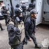 Cảnh sát Ai Cập tuần tra tại quận Giza, phía nam thủ đô Cairo. (Ảnh: AFP/TTXVN)