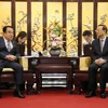 Chủ tịch Quốc hội Hàn Quốc Moon Hee-sang (trái) và Ủy viên Bộ Chính trị, Chủ nhiệm Văn phòng Ủy ban Công tác đối ngoại Trung ương Đảng Cộng sản Trung Quốc, ông Dương Khiết Trì. (Nguồn: The Korea Herald)
