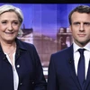 Tổng thống Pháp Emmanuel Macron (phải) và đảng cực hữu của bà Marine Le Pen. (Nguồn: AP)