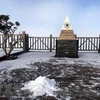 Băng tuyết rơi trắng trên đỉnh Fansipan. (Ảnh: Quốc Khánh/TTXVN)