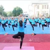 Ngày Quốc tế Yoga tại tỉnh Tiền Giang năm 2018. (Ảnh: Nam Thái/TTXVN)
