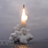 Vụ thử nghiệm tên lửa đạn đạo Pukguksong-3 phóng từ tàu ngầm của Triều Tiên ở ngoài khơi Vịnh Wonsan ngày 2/10/2019. (Nguồn: THX/TTXVN)