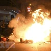 Người biểu tình bạo lực đốt phá trên đường phố tại Hong Kong, Trung Quốc. (Nguồn: THX/TTXVN)